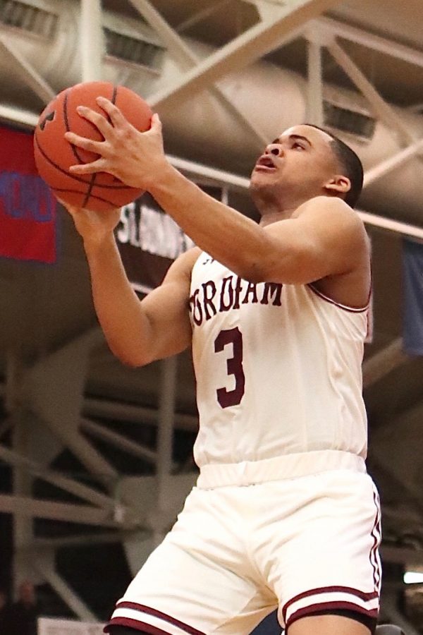 Freshman+guard+Nick+Honor+hit+the+a+last+minute+three-pointer+in+to+life+Fordham+over+Rhode+Island.+%28Courtesy+of+The+Fordham+Ram%29
